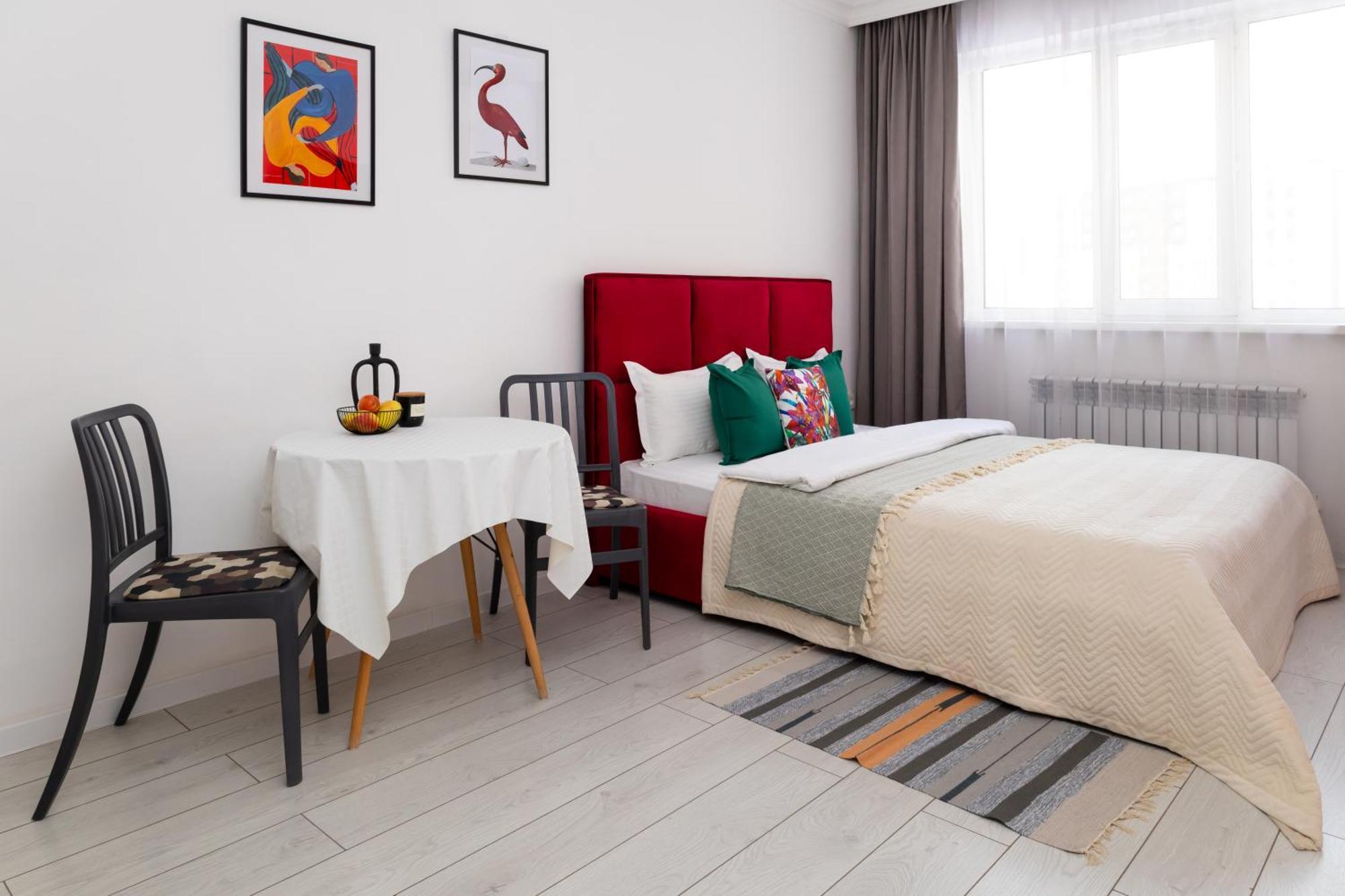 дома- уютная студия в центре Apartment Almaty